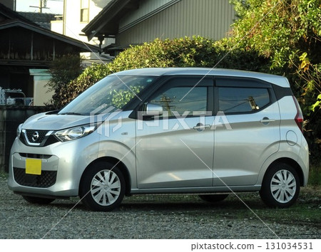 A car parked in a parking lot (Nissan Roox 3rd generation) 131034531