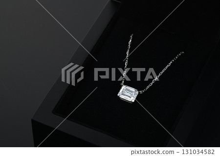 A diamond necklace is displayed in a black box 131034582
