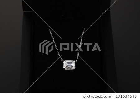 A diamond necklace is in a black box A diamond necklace is in a black box 131034583