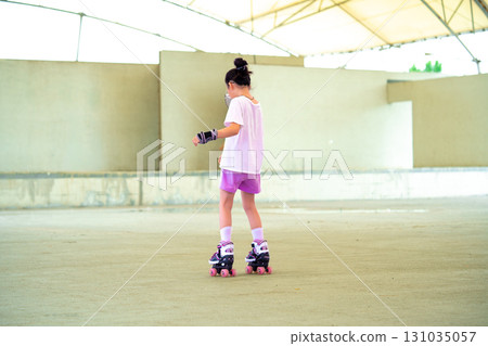 Asian teen girl roller skating. Roller-skating. Korea 131035057
