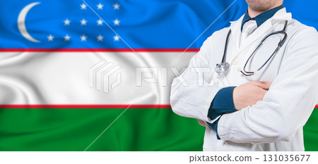 Uzbekistan healthcare concept. Male doctor on Uzbekistan flag. Doctor with crossed arms on Uzbekistan flag Uzbekistan healthcare concept. Male doctor on Uzbekistan flag. Doctor with crossed arms on Uzbekistan flag 131035677