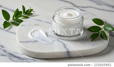 Luxurious white cream in glass jar with green leaves on marble, promoting natural beauty and skincare. Luxurious white cream in glass jar with green leaves on marble, promoting natural beauty and skincare. 131035952