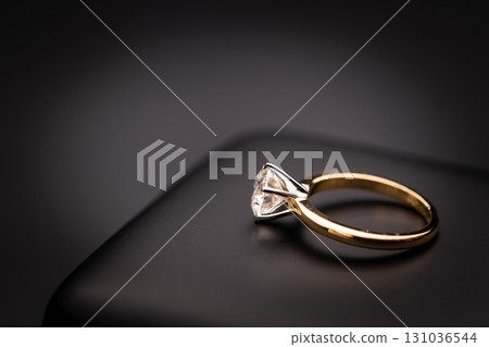 Diamond Ring on Black Jewelry Box 131036544