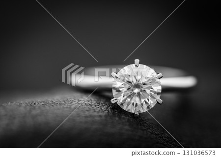 Platinum White Gold Diamond Ring on Dark background Platinum White Gold Diamond Ring on Dark background 131036573