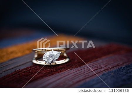 Engagement Diamond Ring on Multicolored background 131036586