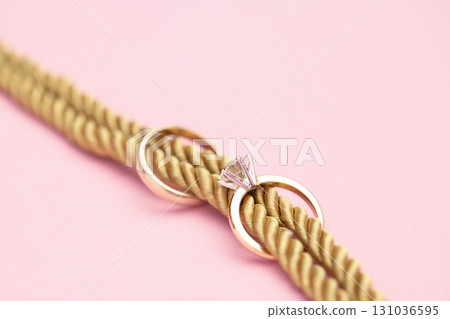Gold Engagement Diamond Ring on Ropes With Knot Gold Engagement Diamond Ring on Ropes With Knot 131036595