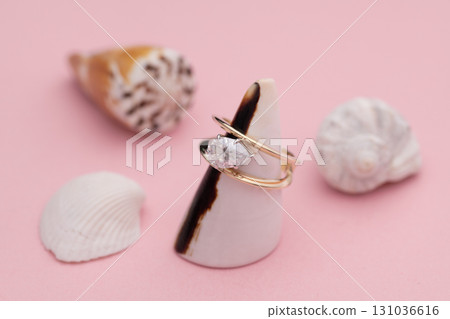 Engagement Diamond Ring on Sea shell Engagement Diamond Ring on Sea shell 131036616