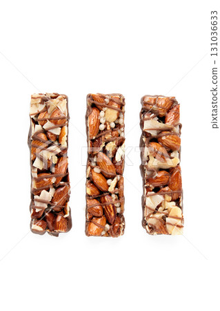 three sweet nut caramel bars isolated on white background top view 131036633