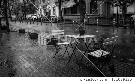 Rainy Day at a Quiet Street Cafe Rainy Day at a Quiet Street Cafe 131039130