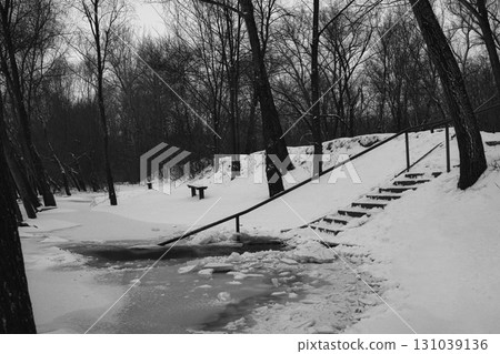 Winter Riverside Serenity: A Frosty Tale Along the Riverbanks 131039136