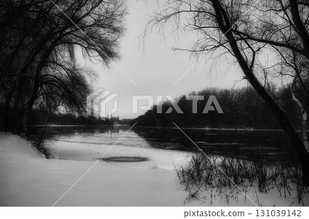 Winter Riverside Serenity: A Frosty Tale Along the Riverbanks 131039142