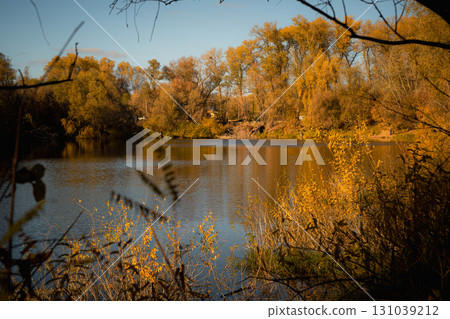 Autumn River Landscape with Colorful Trees and Reflections 131039212