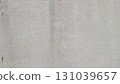 Textured grey concrete wall with weathered imperfections and subtle gradient background 131039657