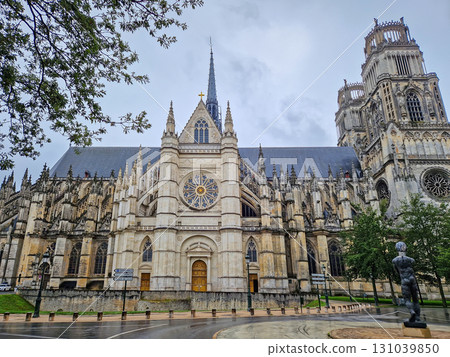 The magnificent Flamboyant Gothic Orleans Cathedral of the Holy Cross on a rainy day. French basilique Sainte-Croix ornate with twin towers and a large rose windows The magnificent Flamboyant Gothic Orleans Cathedral of the Holy Cross on a rainy day. French basilique Sainte-Croix ornate with twin towers and a large rose windows 131039850