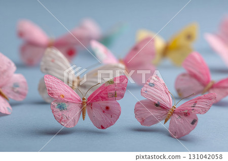 Colorful paper butterfly pink blue craft decorative delicate handmade spring pattern joyful arrangement 131042058