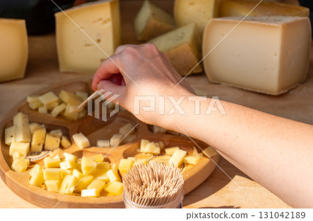 Cheese tasting at farmers market Cheese tasting at farmers market 131042189