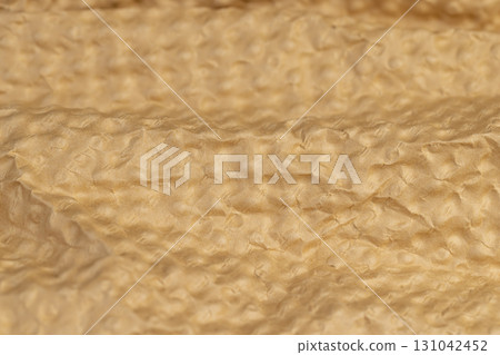 soft corrugated paper for storing equipment , paper details with a raised surface and a large number of irregularities 131042452