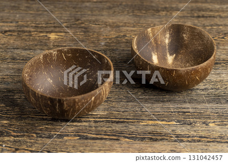 polished bowl made of hard coconut shell , made of coconut wooden bowl with nut structure polished bowl made of hard coconut shell , made of coconut wooden bowl with nut structure 131042457