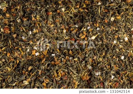 a large amount of large-leaved green tea with the addition of fruits , dry high-quality expensive tea for the tea ceremony with the addition of natural flavors a large amount of large-leaved green tea with the addition of fruits , dry high-quality expensive tea for the tea ceremony with the addition of natural flavors 131042514
