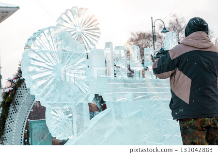 Ice sculpture creation on the city's central square Ice sculpture creation on the city's central square 131042883