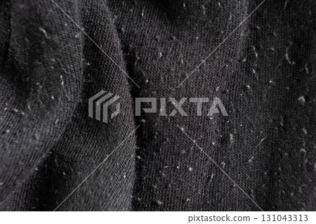 Close-Up of Old Cotton Polyester Elastane Fabric with Pilling Texture 131043313