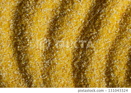 Abstract Yellow Cooking Corn Grits Background. Abstract Yellow Cooking Corn Grits Background. 131043324