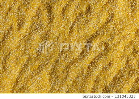 Abstract Yellow Cooking Corn Grits Background 131043325