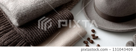 Discover warm autumn accessories featuring rich coffee and earthy colors for a stylish fall look. 131043409