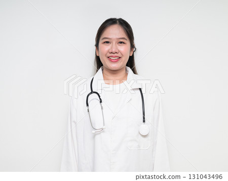 Portrait of Southeast Asian healthcare worker woman doctor in lab coat against white background 131043496