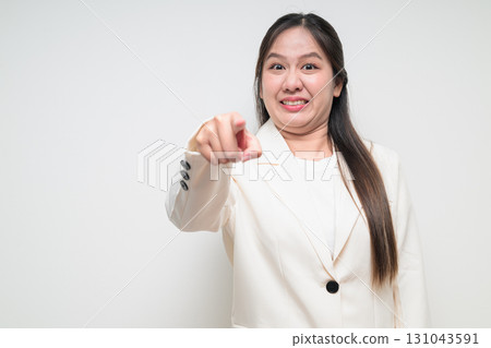Portrait of young Asian woman wearing suit ready for business against white background 131043591