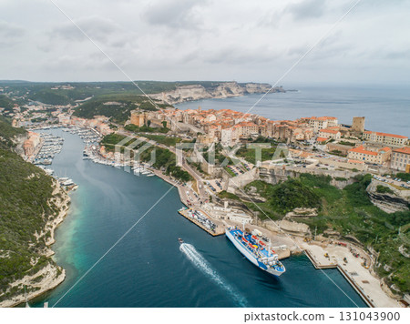 Aerial view marina cape Bonifacio south Corsica France citadel on rocky promontory on wild white limestone cliffs Aerial view marina cape Bonifacio south Corsica France citadel on rocky promontory on wild white limestone cliffs 131043900