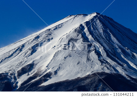 A close-up of the snow-covered summit of Mt. Fuji in winter 131044211