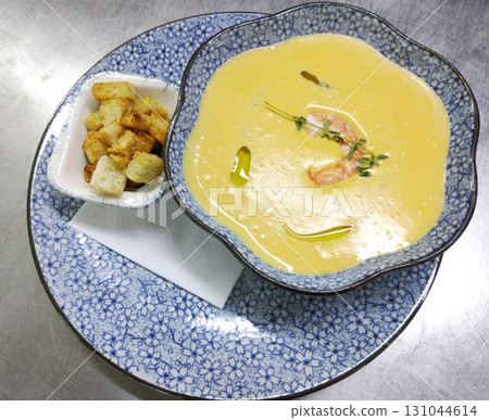 Creamy seafood soup with shrimp and croutons Creamy seafood soup with shrimp and croutons 131044614