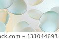 Frosted glass disks overlapping softly against pastel backdrop, generating ethereal depth with translucent geometric shapes and delicate visual harmony 131044693