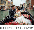 Romantic bride and groom in Venetian gondola with colorful historic buildings. Perfect for wedding albums, travel blogs, and romantic decor. Captures love and timeless elegance 131044856