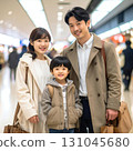 Smiling family at the shopping mall, cheerful lifestyle scene enjoying shopping 131045680