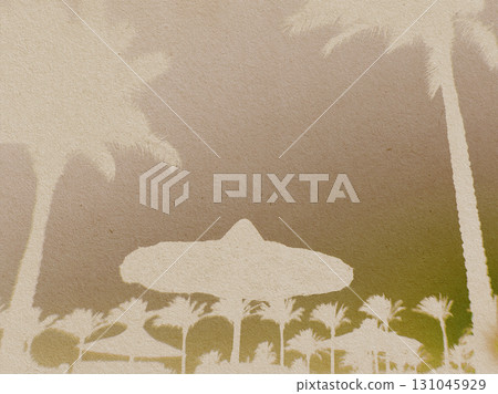 Tropical resort silhouette with palm trees and beach umbrellas. An artistic image featuring a coast scene 131045929