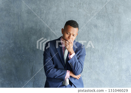 Thinking black businessman Thinking black businessman 131046029