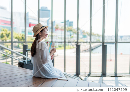 Young woman traveling 131047299