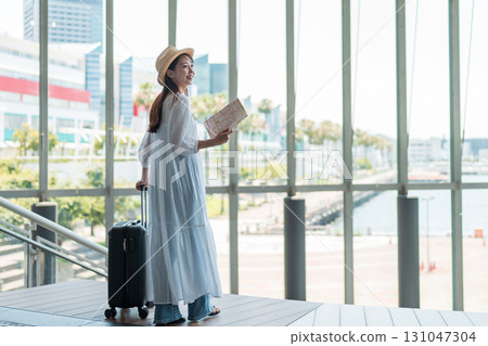 A young woman who enjoys traveling 131047304