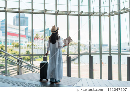 A young woman who enjoys traveling 131047307