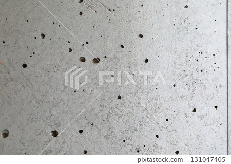 Exposed concrete exterior wall (pinholes) 131047405