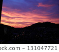 Sunset rising above the city silhouette 131047721