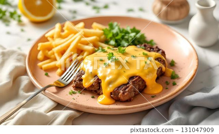A summer plate showcasing a juicy burger with cheese, inspired by the classic Philly cheesesteak 131047909