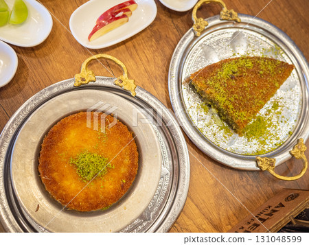 [Turkey] Middle Eastern sweets lined up on a table at a cafe on the outskirts of Istanbul 131048599