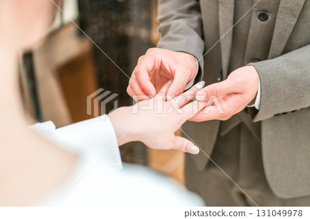 Bride and groom exchanging rings at the wedding hall (wedding, wedding, bridal) 131049978
