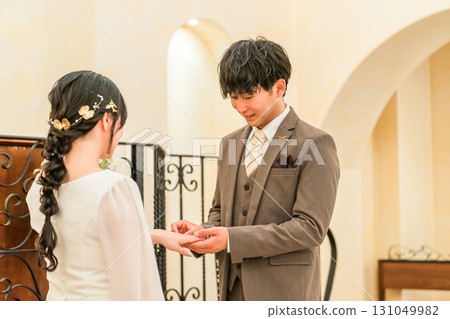 Bride and groom exchanging rings at the wedding hall (wedding, wedding, bridal) 131049982