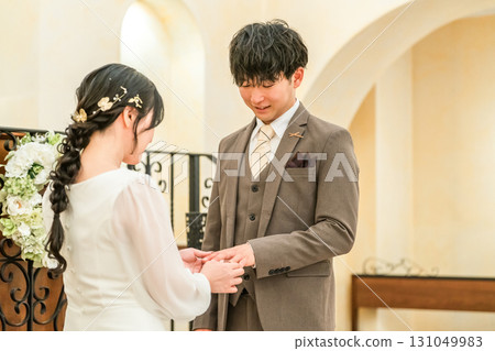 Bride and groom exchanging rings at the wedding hall (wedding, wedding, bridal) 131049983