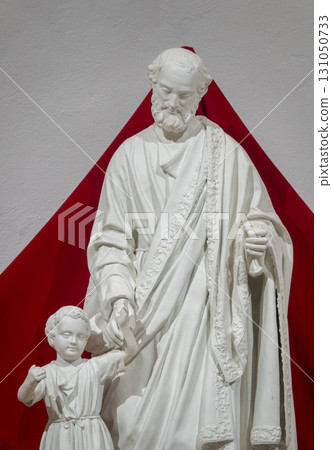 Saint Joseph with baby Jesus Christ 131050733