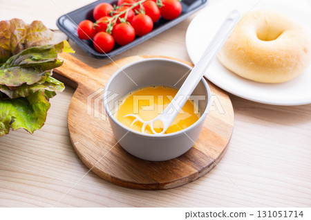 Making an omelet in the microwave: Mix the ingredients Making an omelet in the microwave: Mix the ingredients 131051714